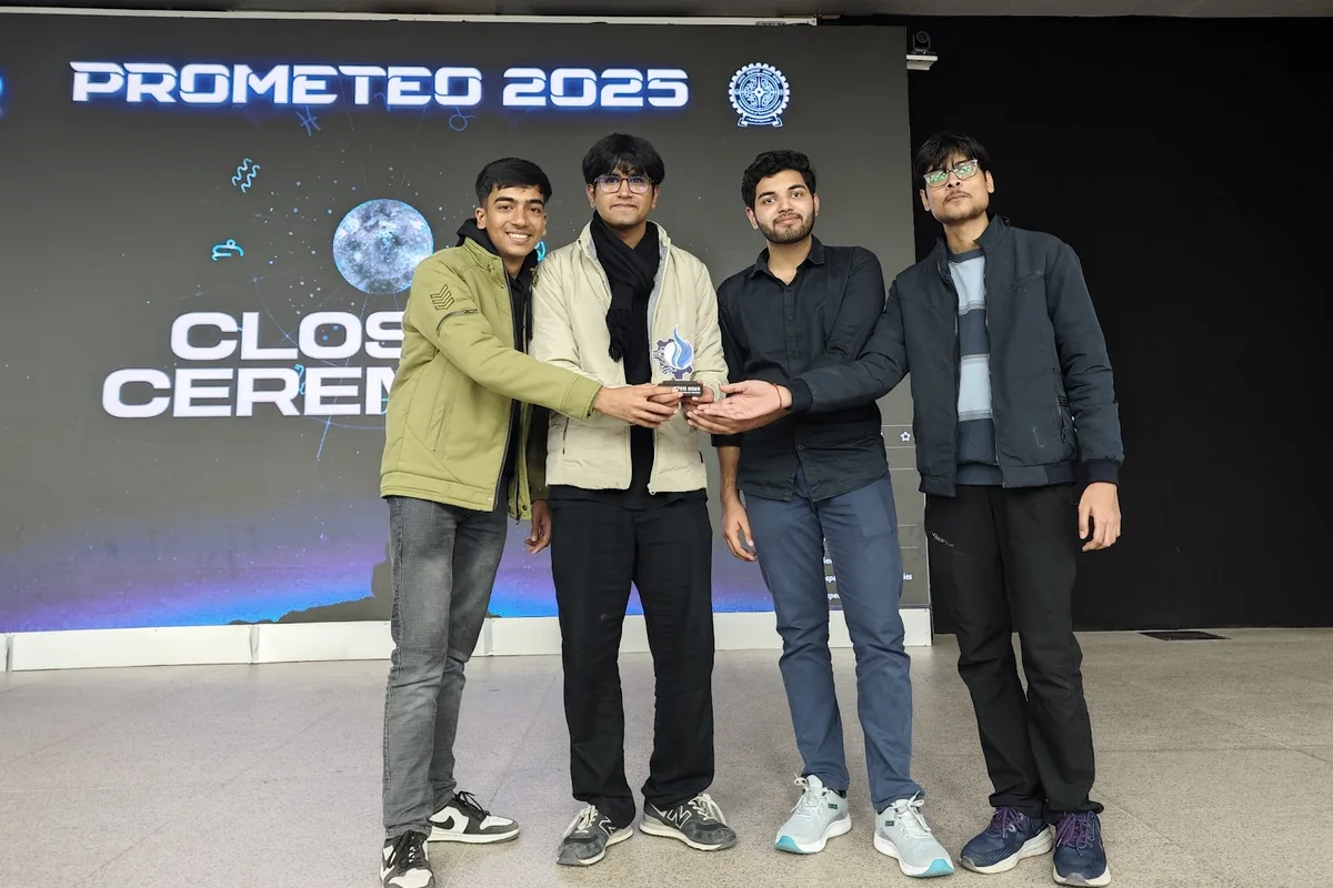 The Sleep Deprived team on stage with the winners' trophy at the Prometeo 2025 closing ceremony, IIT Jodhpur